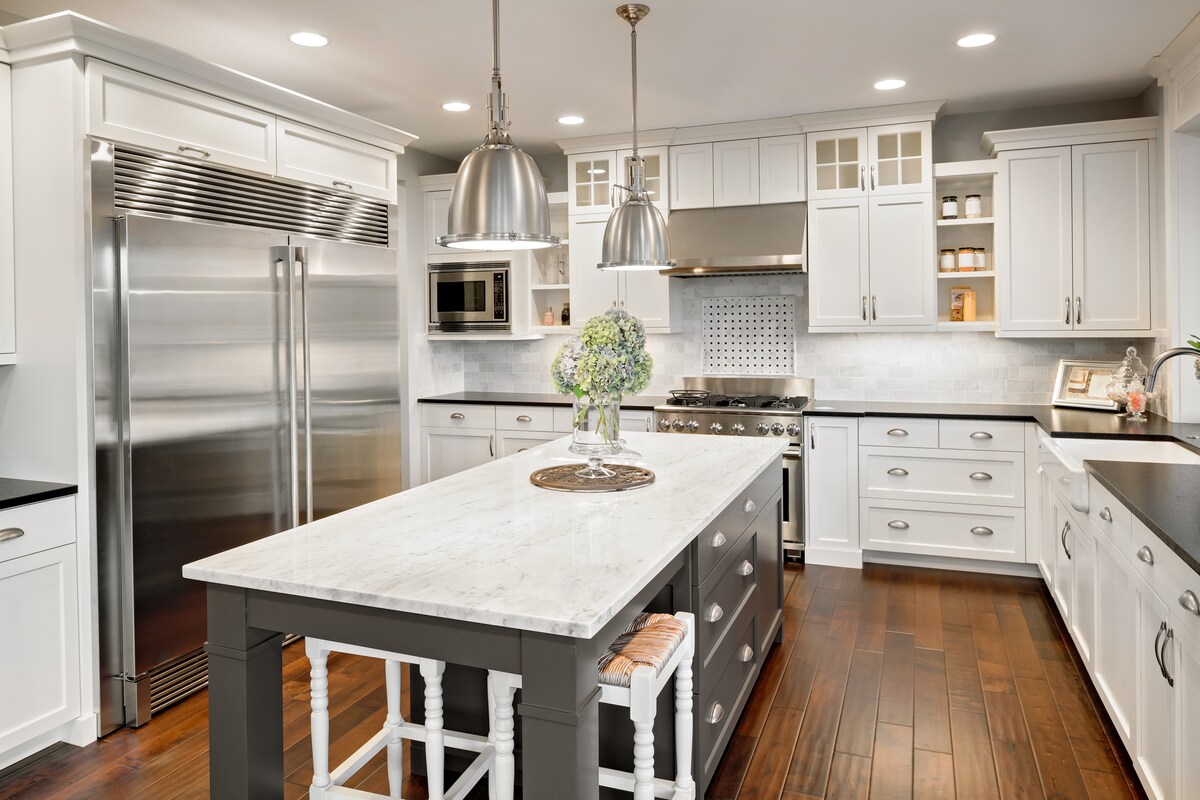 Classy White L-shaped Modular Kitchen