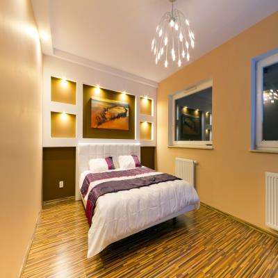 Master Bedroom Design with Brown and Orange Walls