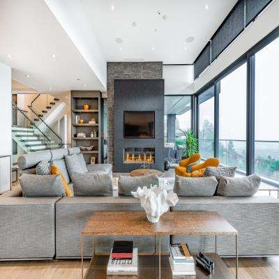 Rich Living Room Design For Abundant Space And A Fireplace