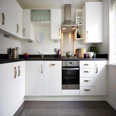 White Modular Kitchen with Stainless Steel Appliances