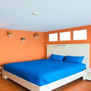 Master Bedroom Design with Blue and Orange Walls