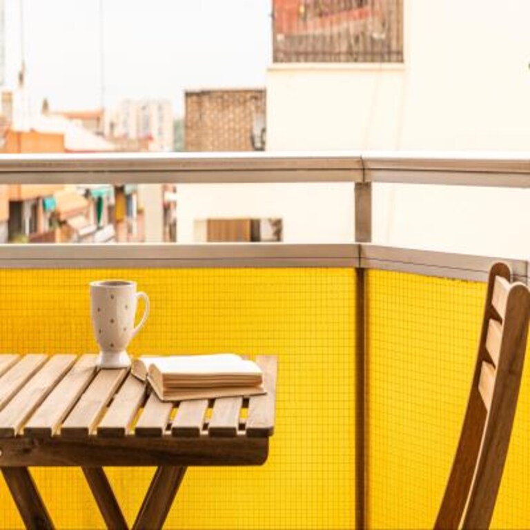 Elegant Vibrant Yellow Balcony Design