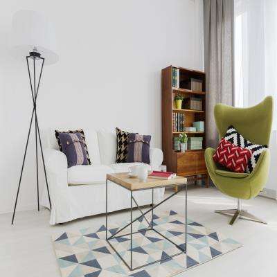 Living Room Designs With Patterned Elements And An Open Bookshelf