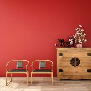Bold Red Living Room Design With A Wooden Cabinet And Vogue Furniture