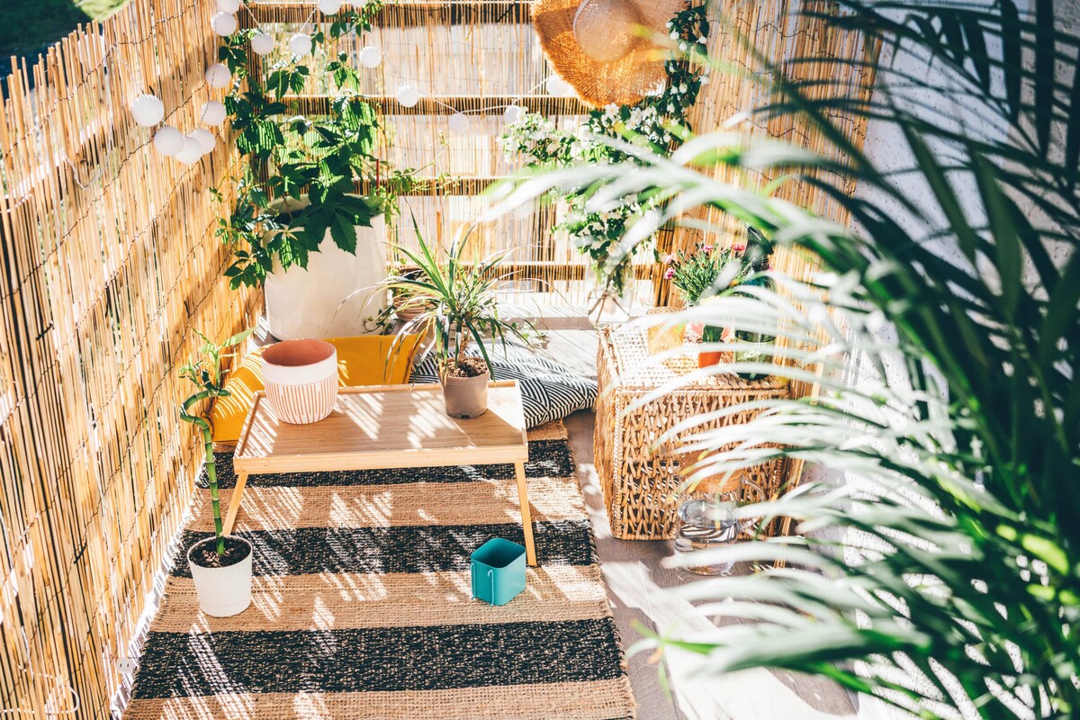 Cosy Balcony Design with Rugs Cosy Balcony Design with Rugs