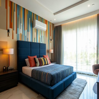 Contemporary Master Bedroom Design With Blue Headboard And Multicoloured Wallpaper