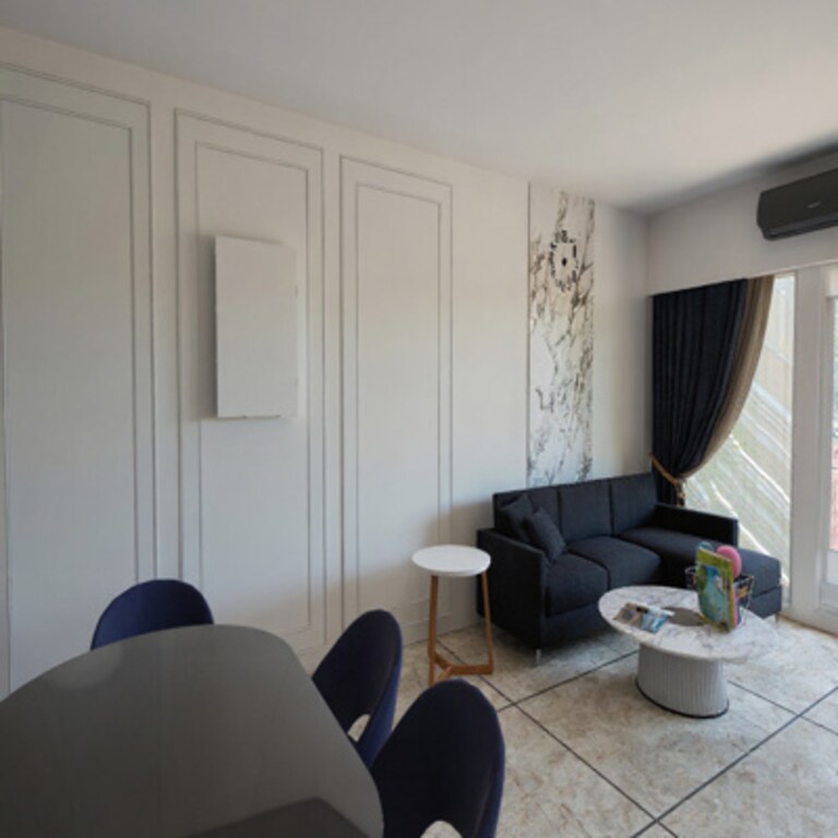 Compact Living Room Design with Marble Accent Strip and Dark Sofa