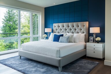 Modern Master Bedroom Design With Grey Tufted Bed And Textured Blue ...