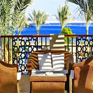 Cosy Modern Balcony design with Wicker Furniture