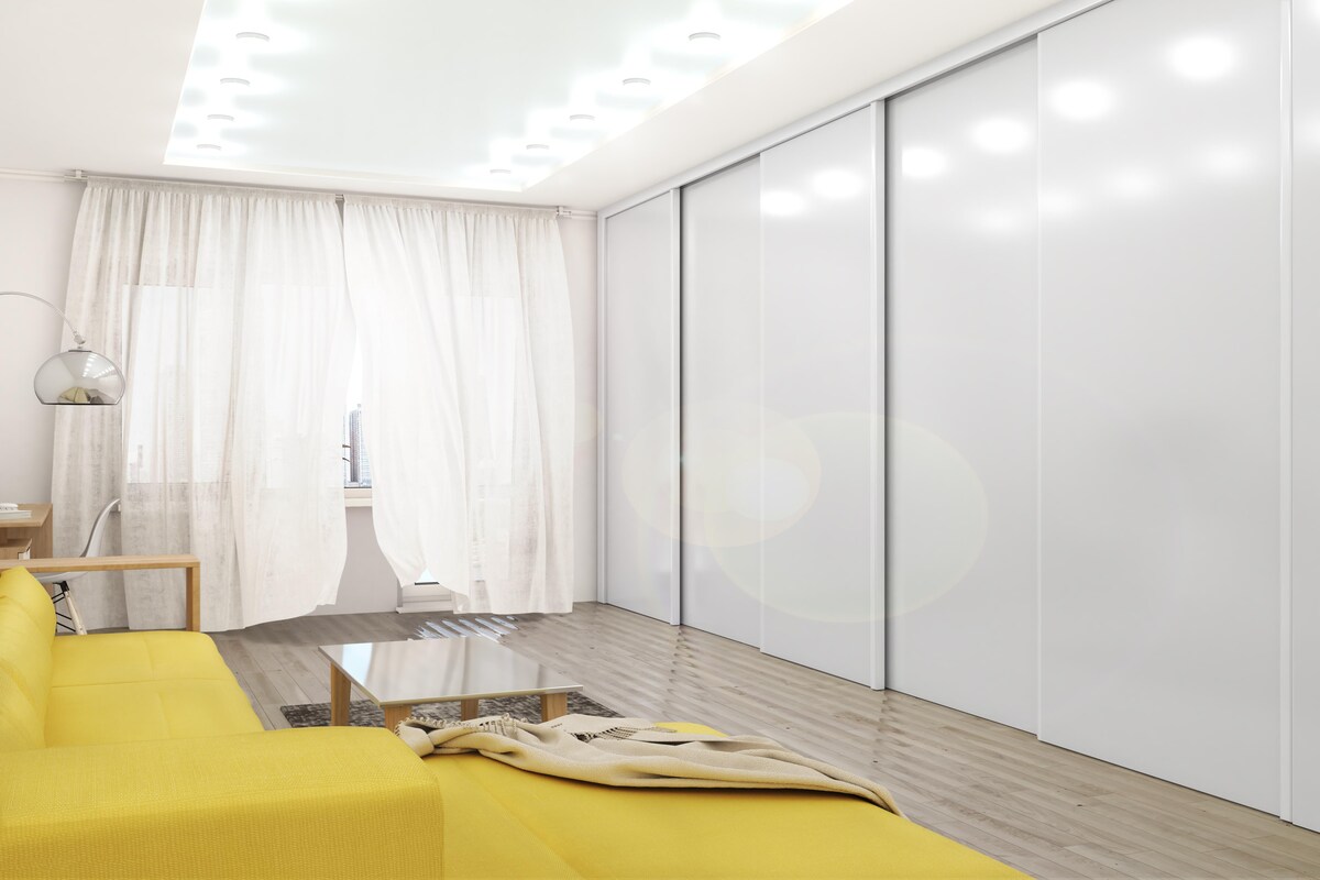 Airy bedroom gloss wardrobe doors