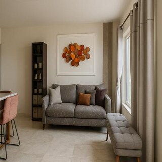 Compact Modern Neutral Living Room Design with Warm Accent Decor