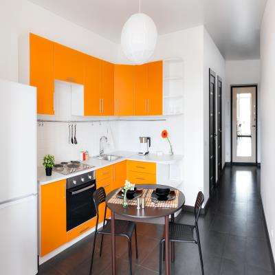 L Shaped Orange Modular Kitchen Design