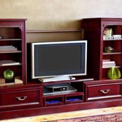 Classic TV Unit Design in Maroon with Open Cabinets and Wooden Floor