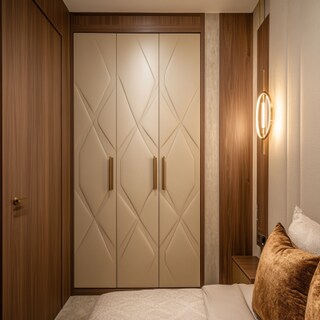 Modern Champagne-Toned 3-Door Swing Wardrobe Design