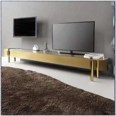 Modern TV Unit Design in Gold with a Brown Rug