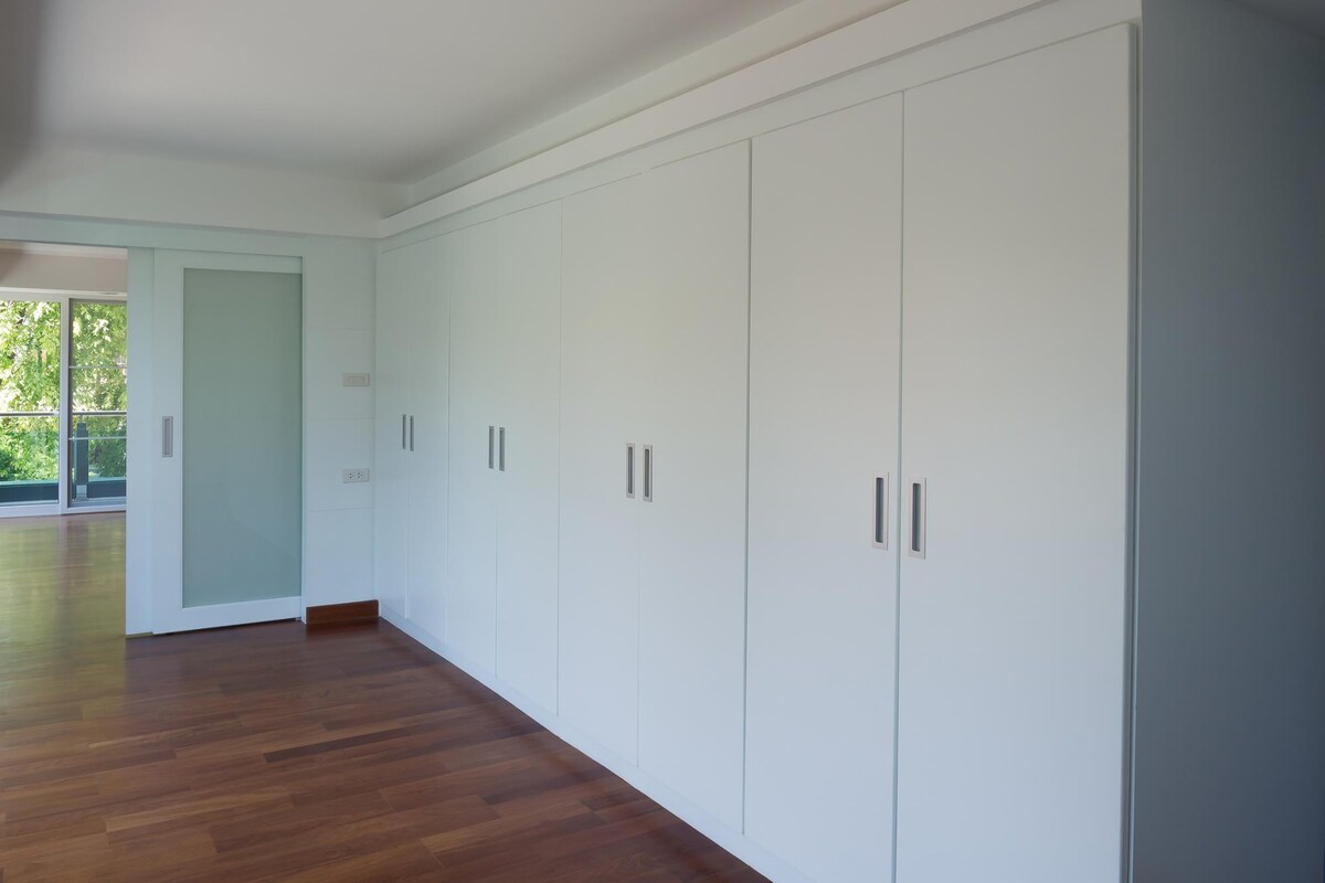 Contemporary Wardrobe Design with Silver Handles