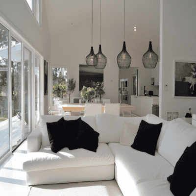 White and Bright Contemporary Living Room Design With L-Shaped Sofa