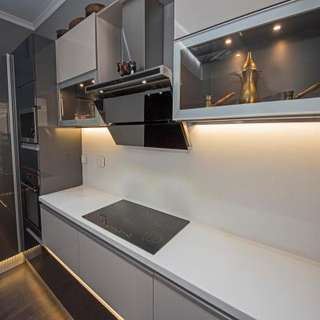Glass Modular Kitchen with Contemporary Fixtures