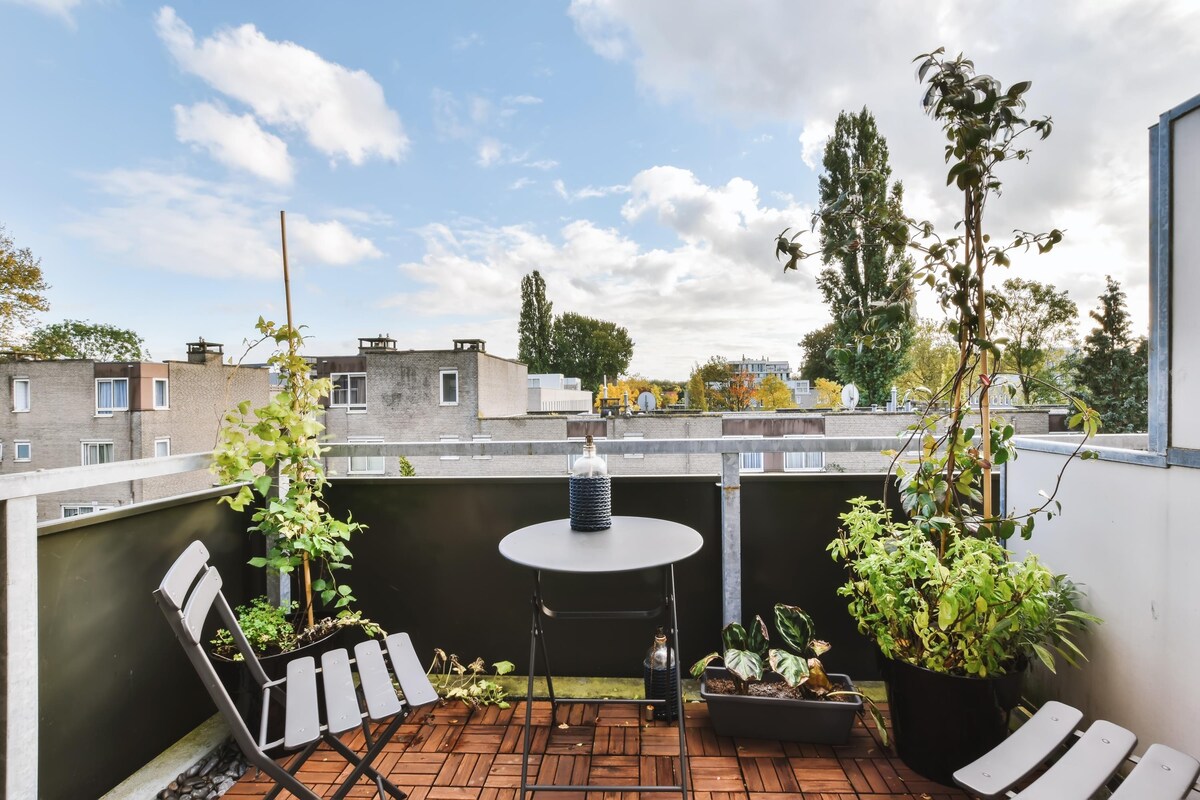 Elegant Contemporary Balcony Design with a Table Elegant Contemporary Balcony Design with a Table