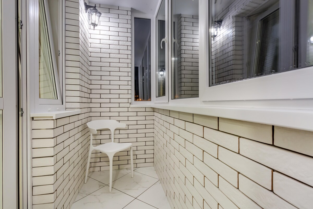 Simple Modern Balcony Design with White Brick Walls. Simple Modern Balcony Design with White Brick Walls.