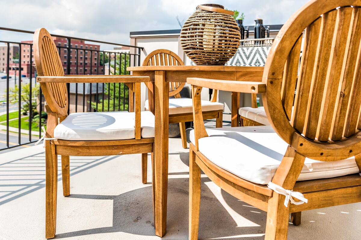 Simple Balcony Design with Wooden Table and Chairs Simple Balcony Design with Wooden Table and Chairs