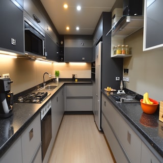 Contemporary Grey Parallel Kitchen Design with Jet Black Granite Counter