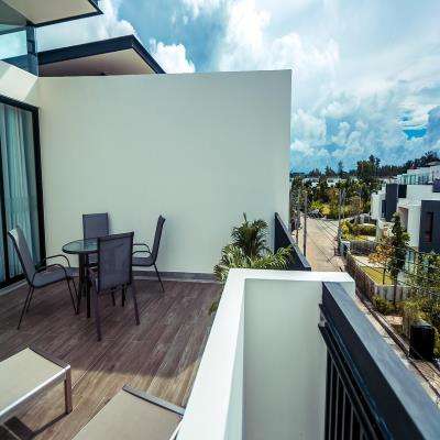 Elegant Balcony Design with Steel Table and Chairs