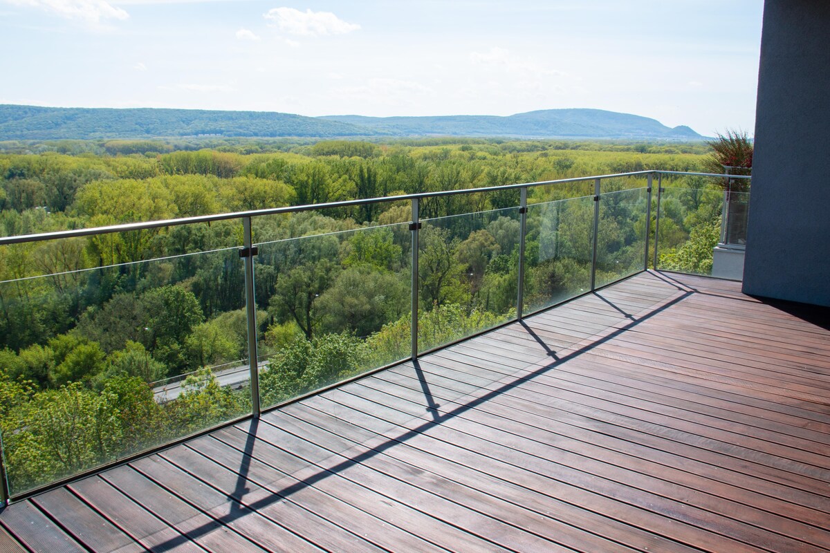 Cosy Contemporary Balcony Design with Wooden Flooring Cosy Contemporary Balcony Design with Wooden Flooring