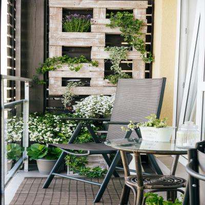 Cosy Contemporary Balcony Design with a Glass Coffee Table