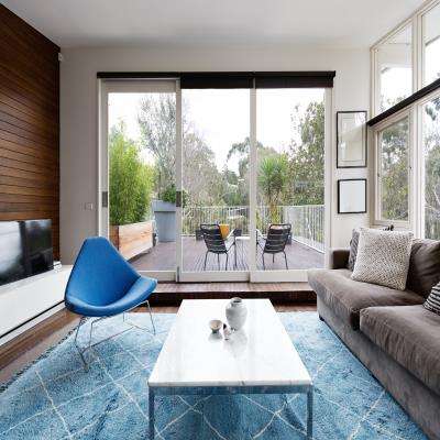 Living Room Design With Sliding Doors Leading To The Backyard