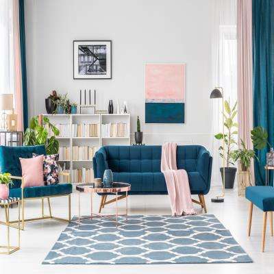 Vougish Living Room Design in Blue and Pink Colour Combination