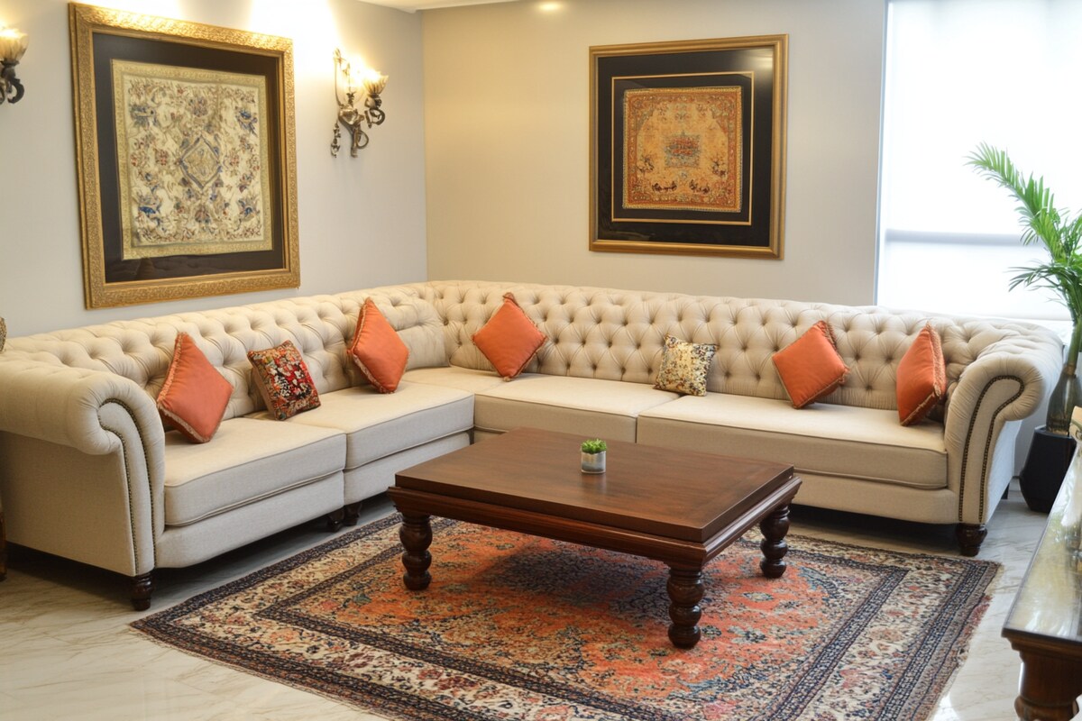 Traditional Living Room Design with L-shape Sofa and Artwork