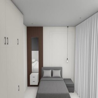 Bedroom with Compact Storage and Hanging Light