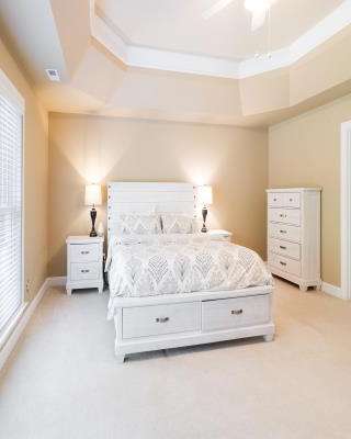 Master Bedroom Design with a White Headboard