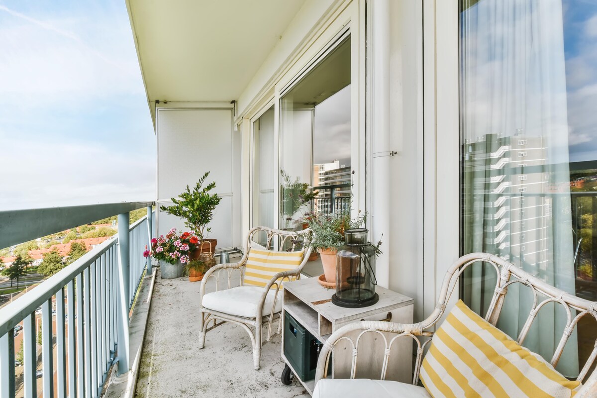 Elegant Contemporary Balcony Design with Arm Chairs