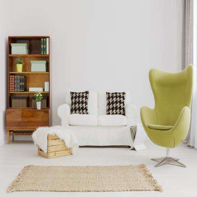 A Stylish Living Room Design With Green Swivel Chair