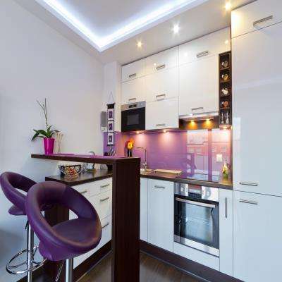 Laminated Modular Kitchen with Purple Hues