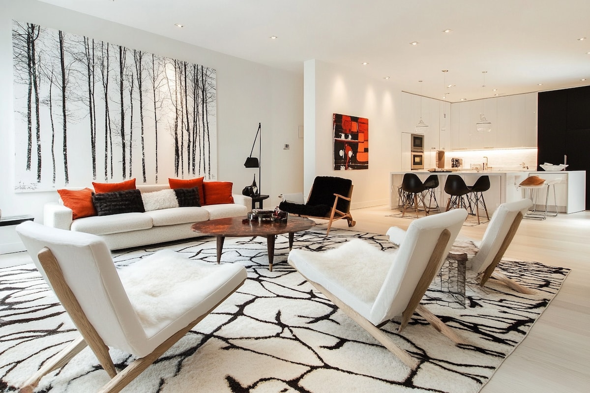 Modern Living Room Design With White Tree Print Seating