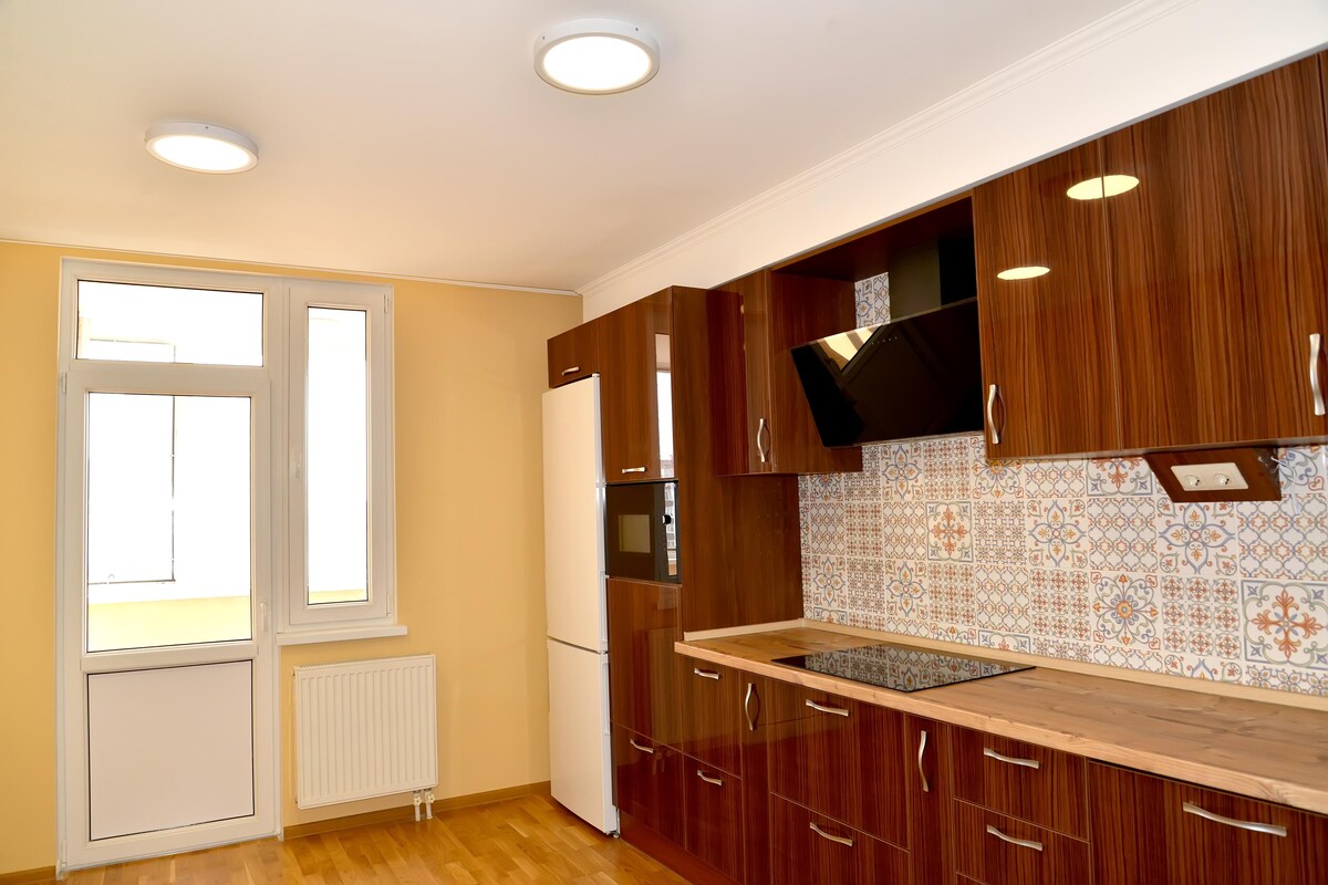 Glossy Brown Modular Kitchen Design