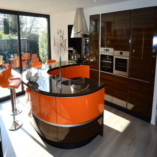 Modern Modular Brown And Orange Island Kitchen Design