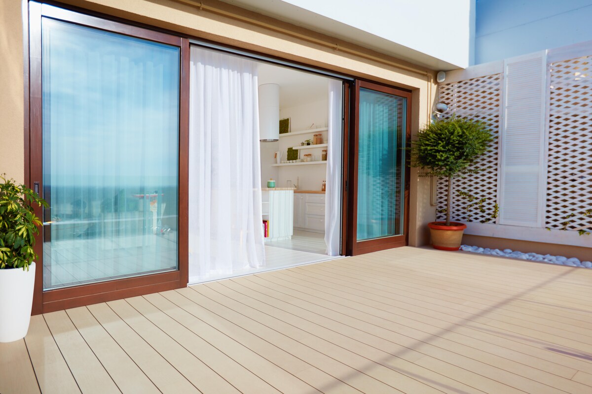 Cosy Contemporary Balcony Design with Glass Sliding Doors Cosy Contemporary Balcony Design with Glass Sliding Doors