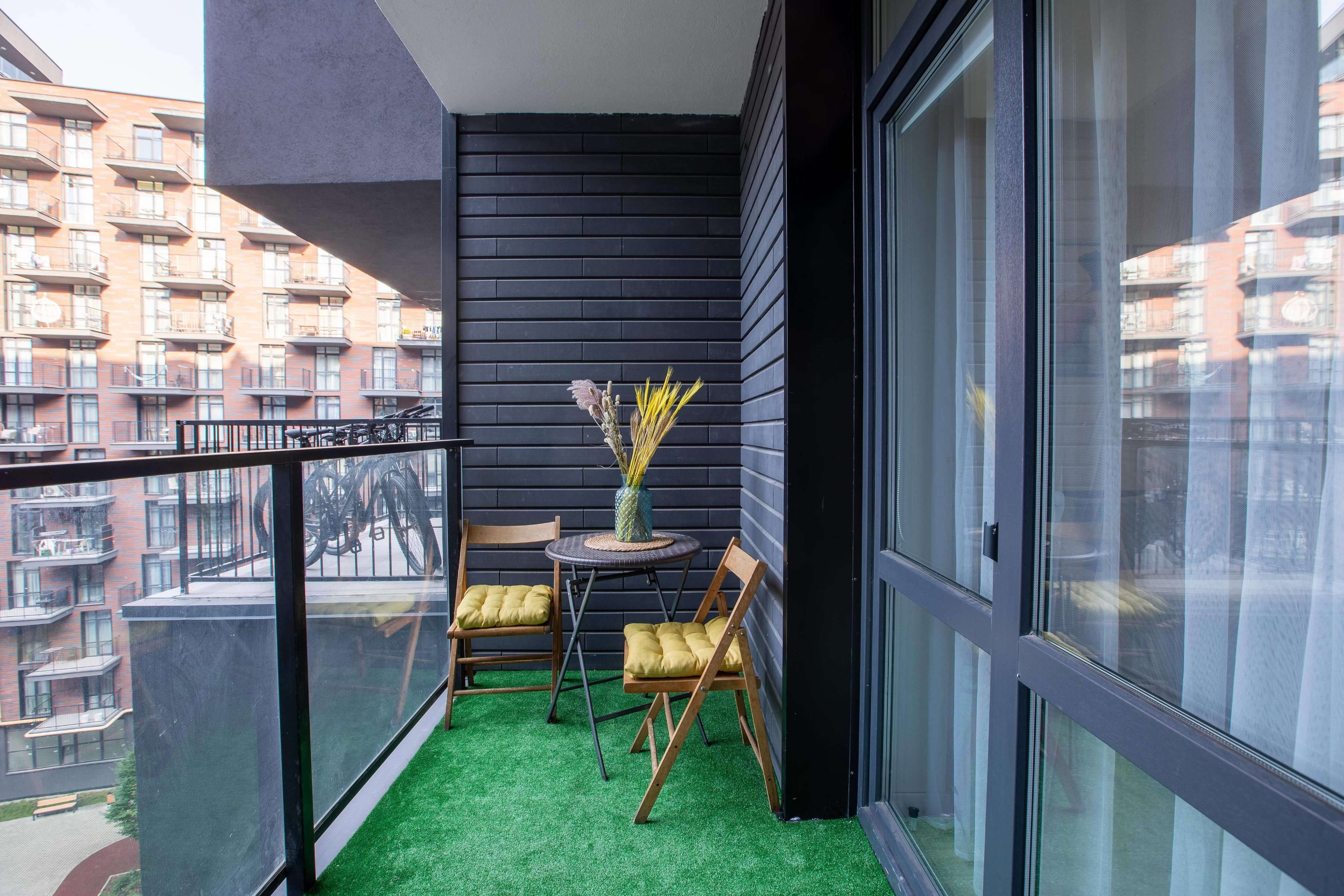 Cosy Contemporary Balcony Design with a Table