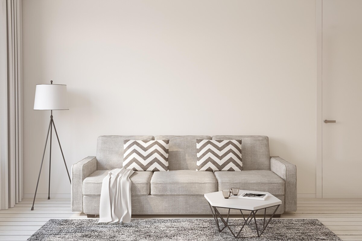 Calming White Living Room Design With A Surface Rug and Lamp Calming White Living Room Design With A Surface Rug and Lamp