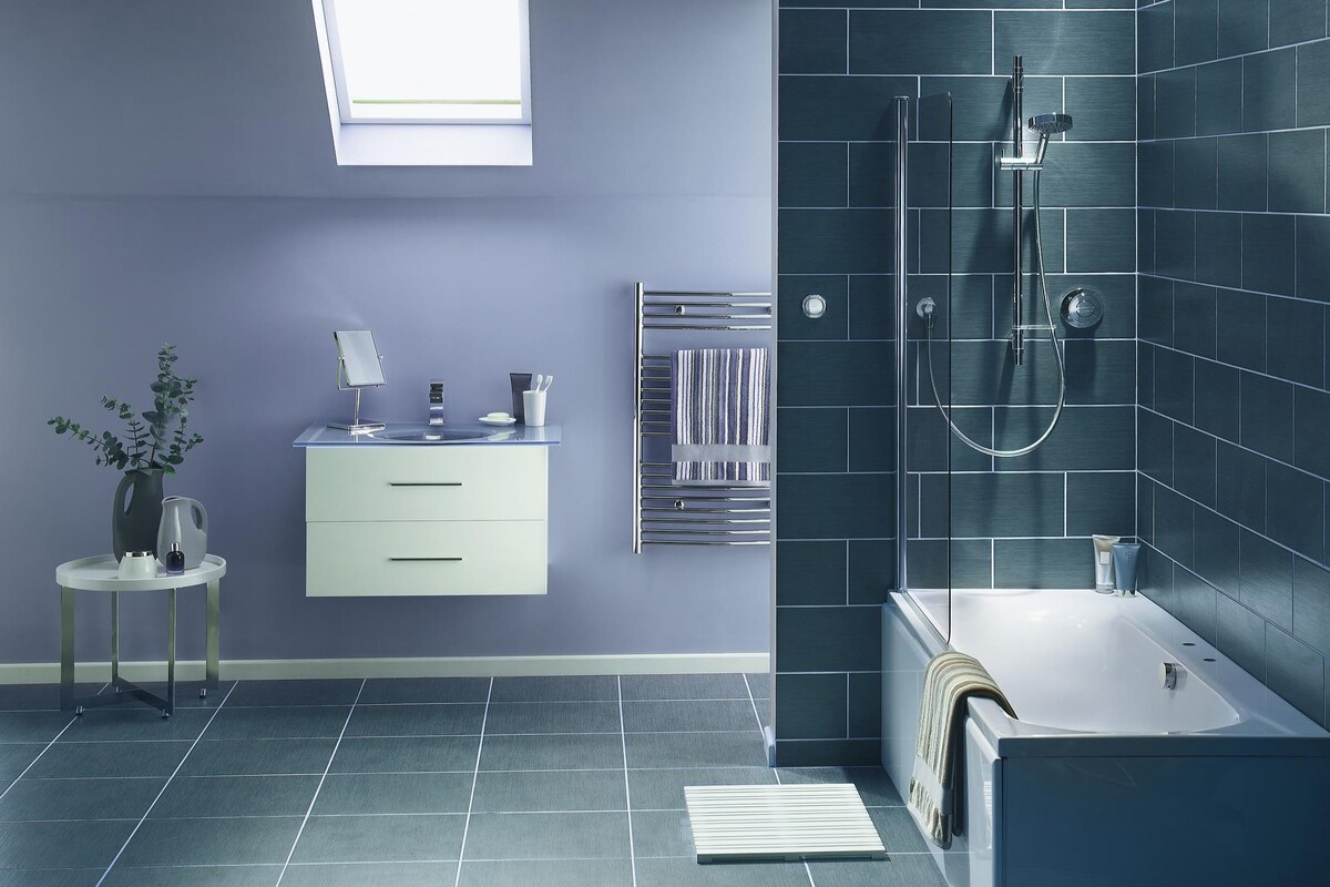 Modern bathroom design with blue floor tiles Modern bathroom design with blue floor tiles