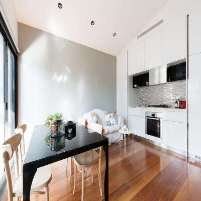 Living Room Design With Adjacent Open Kitchen