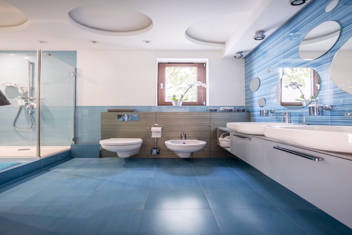 Contemporary Bathroom Design With Blue Floor Tiles