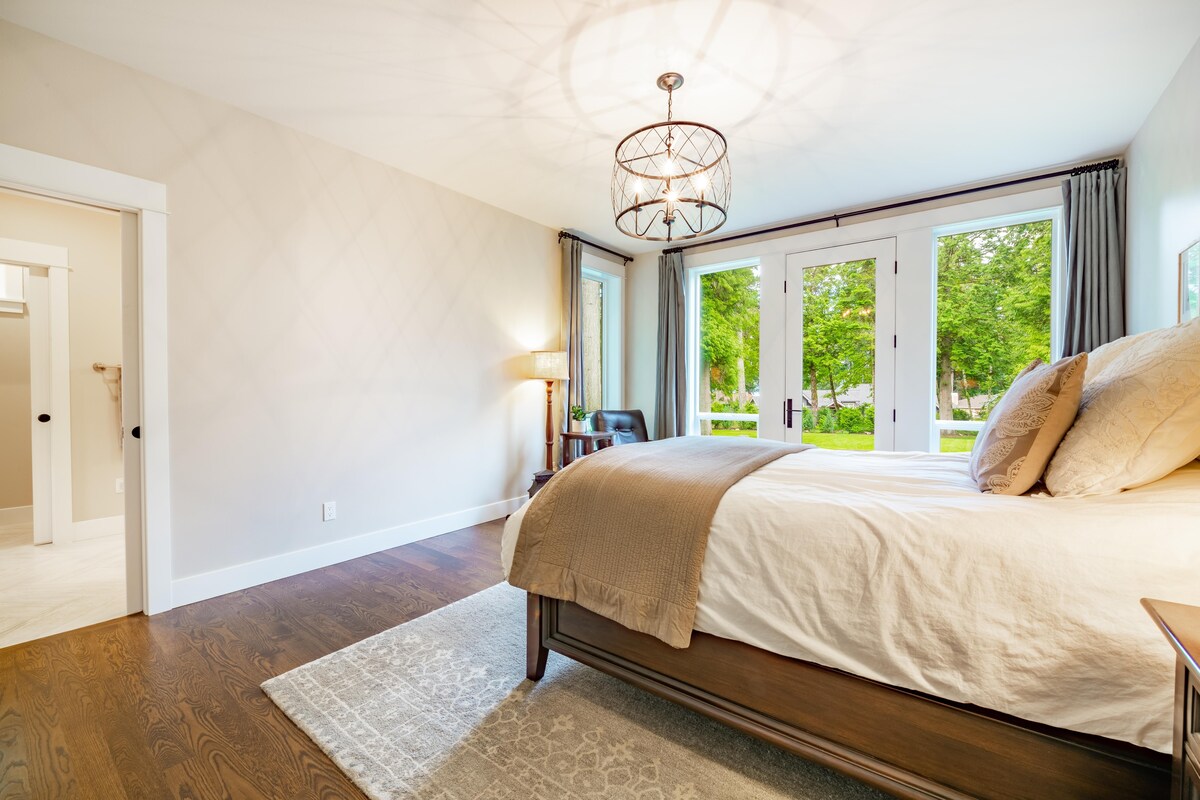 Master Bedroom Design with Dark Wood Floors