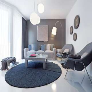 A Modern Living Room With Dark Coloured Sofa