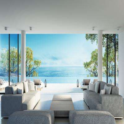 A Sea Facing Living Room Design With Open Deck Yard