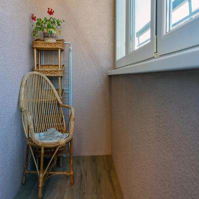 Simple Contemporary Balcony Design with Wicker Furniture